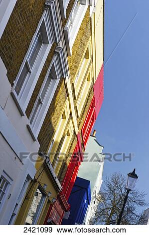 Colourful facades of buildings in a row, Portobello Road; London, England View Large Photo Image Stock Photo - Colourful facades of buildings in a row, Portobello Road; London, England. Fotosearch