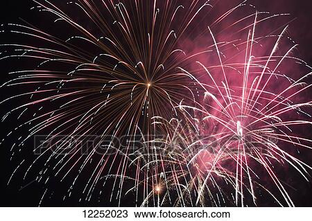 Colourful fireworks in the night sky; Port Colborne, Ontario, Canada View Large Photo Image Stock Image - Colourful fireworks in the night sky; Port Colborne, Ontario, Canada. Fotosearch