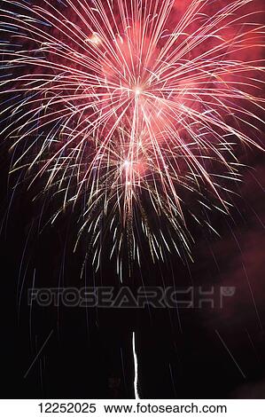 Colourful fireworks in the night sky; Port Colborne, Ontario, Canada View Large Photo Image Stock Photography - Colourful fireworks in the night sky; Port Colborne, Ontario, Canada. Fotosearch