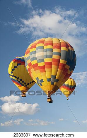 Colourful Hot Air Balloons In Flight For Balloon Fiesta; Albuquerque, New Mexico, United States Of America View Large Photo Image Stock Photo - Colourful Hot Air Balloons In Flight For Balloon Fiesta; Albuquerque, New Mexico, United States Of America. Fotosearch
