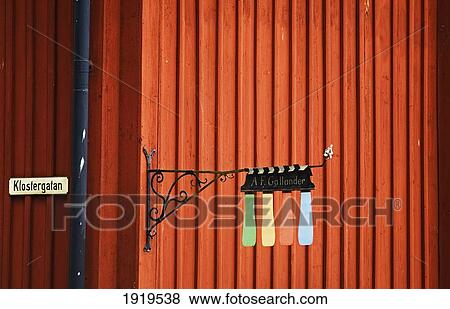 Colourful House Sign Outside Wooden Building Painted In Falu Red, Mariefred, Sweden View Large Photo Image Stock Photo - Colourful House Sign Outside Wooden Building Painted In Falu Red, Mariefred, Sweden. Fotosearch