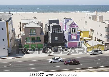 Stock Photo - Colourful houses along the coast; California, United States of America. Fotosearch