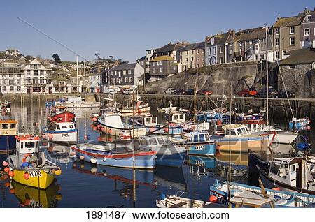 Stock Photo - Colourful Old Wooden Fishing Boats In Port Of Mevagissey. Fotosearch