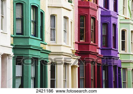 Colourful residential buildings in a row, Notting Hill; London, England View Large Photo Image Stock Photograph - Colourful residential buildings in a row, Notting Hill; London, England. Fotosearch