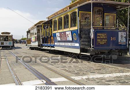 Colourful San Francisco Cable Cars On Cobbled Stone Street; San Francisco California United States Of America View Large Photo Image Stock Image - Colourful San Francisco Cable Cars On Cobbled Stone Street; San Francisco California United States Of America. Fotosearch