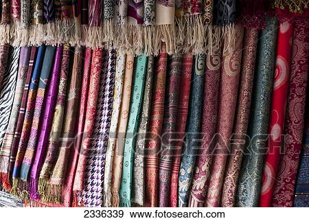 Stock Photo - Colourful Scarves Hanging On Display; China. Fotosearch