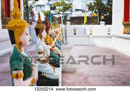 Picture - Colourful statues in a temple; Chiang Mai, Thailand. Fotosearch