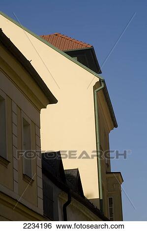 Stock Photograph - Colourfully restored Buildings on cobbled Kapitilska Street. Bratislava, Slovakia.. Fotosearch