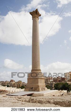 Stock Image - Column Of Red Granite 30M Tall, Erected In 298 Ad In Honour Of The Emperor Diocletian On The Acropolis Of Alexandria. It Was Wrongly Named PompeyÃƒÆ’Ã¢â‚¬Â S Pillar By Travellers During The Middle Ages, Alexandria, Al Iskandar. Fotosearch