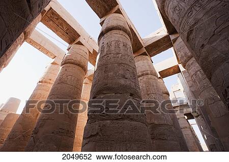 Stock Image - Columns Of The Great Hypostyle Hall Of The Temple Of Amun In The Karnak Temple Complex, Luxor, Qina, Egypt. Fotosearch