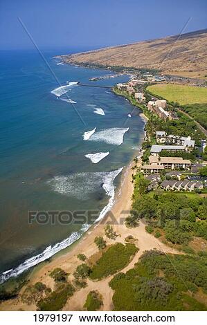 Stock Photo - Condominiums and resorts along Maalaea Bay; Maui, Hawaii, United States of America. Fotosearch