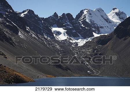 Stock Photo - Condorri peak and glacial lake, Cordillera Real; Bolivia. Fotosearch