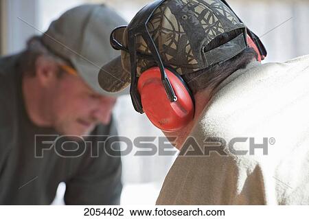 Construction Worker Wearing Ear Protection, Ontario View Large Photo Image Stock Image - Construction Worker Wearing Ear Protection, Ontario. Fotosearch