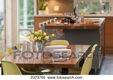 Contemporary Kitchen With Two Eating Areas; Victoria, Vancouver Island, British Columbia, Canada View Large Photo Image Stock Photography - Contemporary Kitchen With Two Eating Areas; Victoria, Vancouver Island, British Columbia, Canada. Fotosearch