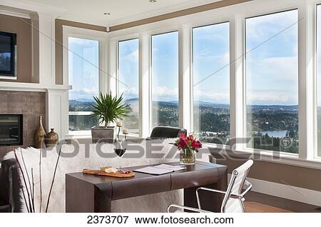 Stock Photo - Contemporary Living Room With Cordova Bay Water View; Langford, Vancouver Island, British Columbia, Canada. Fotosearch