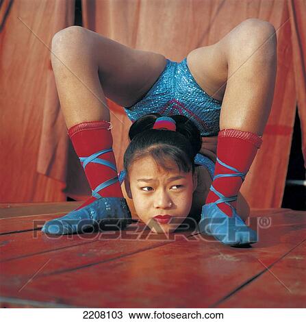 Stock Image - Contortionist, Indian Circus, Maharashtra, India.. Fotosearch