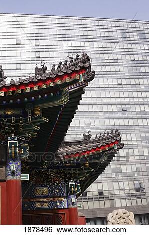 Contrast Of Traditional And Modern Buildings. View Large Photo Image Stock Photograph - Contrast Of Traditional And Modern Buildings.. Fotosearch