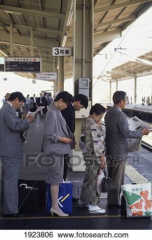 Contrasting Styles Waiting For Train View Large Photo Image Stock Photograph - Contrasting Styles Waiting For Train. Fotosearch