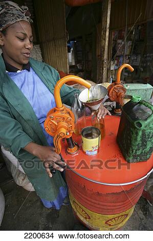 Picture - Cooking Oil Stall In The Central Market Addis Ababa Ethiopia. Fotosearch