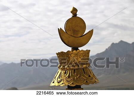 Copper Tibetan Buddhist Victory Banner On The Roof Of The Thikse Monastery With Stok Mountain Range In Background View Large Photo Image Stock Photography - Copper Tibetan Buddhist Victory Banner On The Roof Of The Thikse Monastery With Stok Mountain Range In Background. Fotosearch