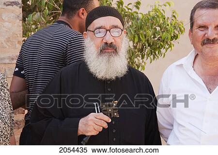 Coptic Monk At The Monastery Of The Holy Virgin And St. John Kame, Also Called Deir El Sourian, Wadi El Natrun, Egypt View Large Photo Image Stock Photography - Coptic Monk At The Monastery Of The Holy Virgin And St. John Kame, Also Called Deir El Sourian, Wadi El Natrun, Egypt. Fotosearch
