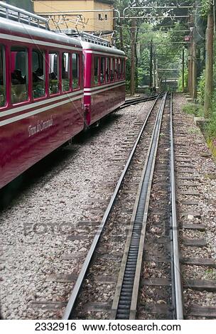 Stock Photograph - Corcovado Rack Train Going To Christ The Redeemer Statue, Cosme Velho Neighbourhood; Rio De Janeiro, Brazil. Fotosearch