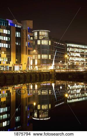 Cork, Cork County, Ireland; Modern Cork City With Clarion Hotel Illuminated At Night Along River Lee View Large Photo Image Picture - Cork, Cork County, Ireland; Modern Cork City With Clarion Hotel Illuminated At Night Along River Lee. Fotosearch