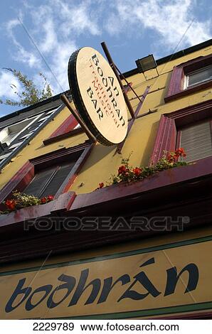 Cork, Ireland, European Capital Of Culture 2005. An Bodhran Traditional Irish Music Bar, Oliver Plunkett Street. Copyright View Large Photo Image Stock Photo - Cork, Ireland, European Capital Of Culture 2005. An Bodhran Traditional Irish Music Bar, Oliver Plunkett Street. Copyright. Fotosearch