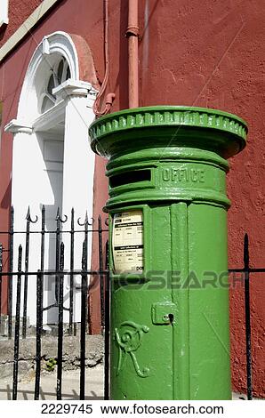 Cork, Ireland, European Capital Of Culture 2005. Green Irish Postbox In Front Of Red Georgian House, Sheare Street. Copyright View Large Photo Image Stock Photography - Cork, Ireland, European Capital Of Culture 2005. Green Irish Postbox In Front Of Red Georgian House, Sheare Street. Copyright. Fotosearch