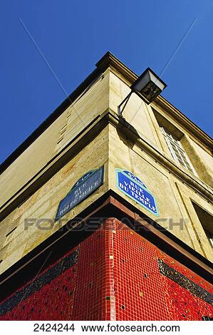 Corner of a building and blue sky in the historical district of the Marais; Paris, France View Large Photo Image Picture - Corner of a building and blue sky in the historical district of the Marais; Paris, France. Fotosearch