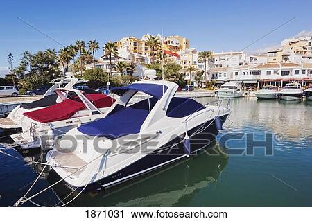 Costa Del Sol, Malaga, Spain; Boats In A Marina In Puerto Cabopino View Large Photo Image Stock Image - Costa Del Sol, Malaga, Spain; Boats In A Marina In Puerto Cabopino. Fotosearch