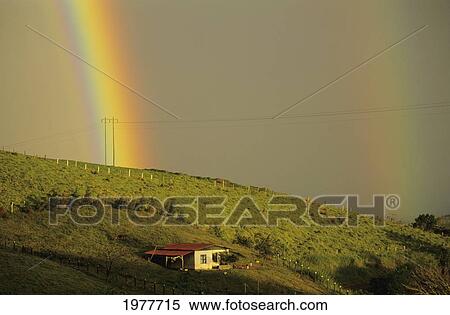 Stock Photography - Costa Rica, Beautiful landscape with double rainbow near lake Arenal; Arnal. Fotosearch