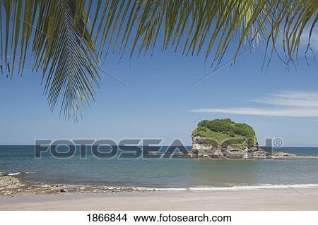 Costa Rica; Small Rock Island Off The Beach View Large Photo Image Picture - Costa Rica; Small Rock Island Off The Beach. Fotosearch