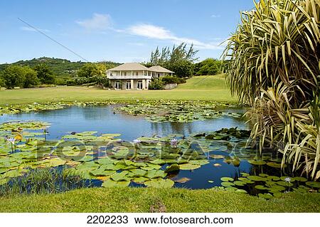 Stock Image - Cotton House In Mustique Island, St Vincent And The Grenadines, West Indies. Fotosearch