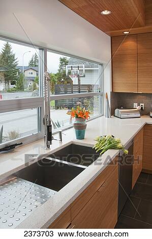 Countertop And Window Of Contemporary Kitchen; Victoria, Vancouver Island, British Columbia, Canada View Large Photo Image Stock Image - Countertop And Window Of Contemporary Kitchen; Victoria, Vancouver Island, British Columbia, Canada. Fotosearch