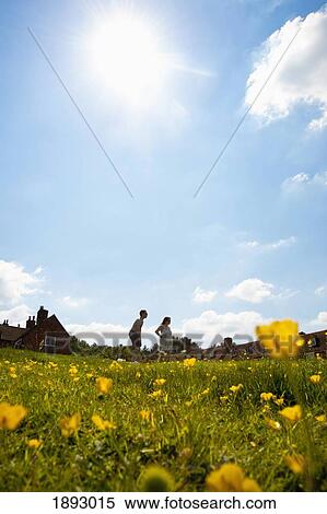 Couple And Flowers In The Shipbuilding Village Of Buckler's Hard, New Forest National Park View Large Photo Image Stock Photography - Couple And Flowers In The Shipbuilding Village Of Buckler's Hard, New Forest National Park. Fotosearch