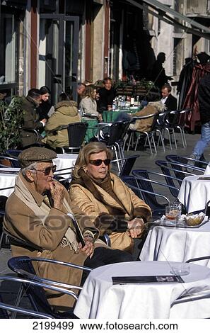 Stock Photo - Couple At A Cafe On Campo San Stefano. Venice, Italy.. Fotosearch