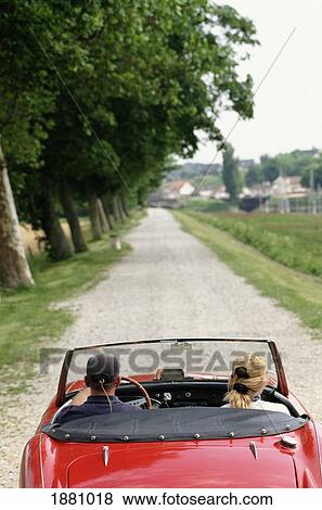 Couple Driving In Open Top Austin Healey Car View Large Photo Image Stock Photo - Couple Driving In Open Top Austin Healey Car. Fotosearch