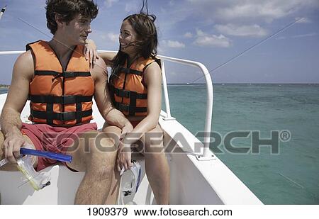 Stock Photo - Couple In Boat On Mayan Riviera, Yucatan Peninsular, Quintana Roo State, Mexico. Fotosearch