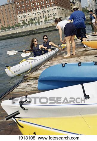 Stock Photo - Couple Kayaking In Husdon River Park. Fotosearch