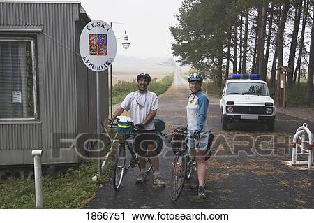 Couple On Bikes At The Czech Republic Boarder Crossing View Large Photo Image Stock Image - Couple On Bikes At The Czech Republic Boarder Crossing. Fotosearch