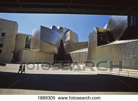 Stock Photography - Couple On Steps Beside Guggenheim Art Museum. Fotosearch