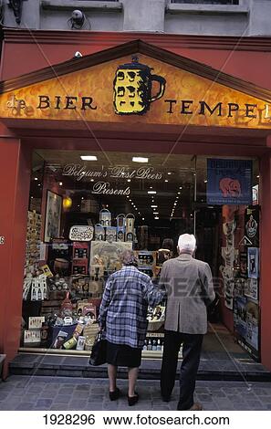 Stock Photograph - Couple Outside Beer Store. Fotosearch