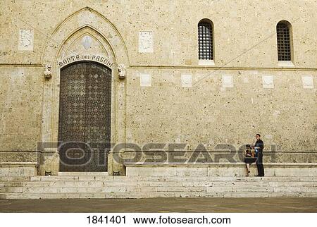 Couple Outside Building In Siena; Tuscany, Italy View Large Photo Image Stock Image - Couple Outside Building In Siena; Tuscany, Italy. Fotosearch