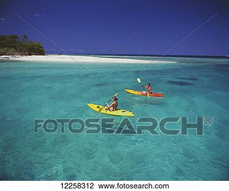 Couple paddling near Eratap Island; Efate, Vanuatu View Large Photo Image Stock Image - Couple paddling near Eratap Island; Efate, Vanuatu. Fotosearch