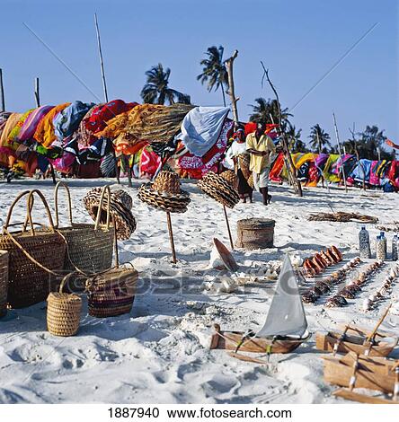 Stock Image - Couple Selling Craft Work On Diani Beach. Fotosearch