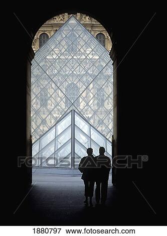 Couple Walking Through Passage Richelieu To Louvre Pyramid View Large Photo Image Stock Photo - Couple Walking Through Passage Richelieu To Louvre Pyramid. Fotosearch