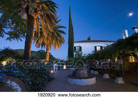 Stock Image - Courtyard Of La Trasiera At Dusk, Cazalla De La Sierra, Andalucia, Spain. Fotosearch