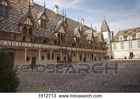 Stock Image - Courtyard Of The HÃƒÆ’Ã‚Â´tel-Dieu De Beaune (Hospices De Beaune); Beaune, Cote D'or, France. Fotosearch