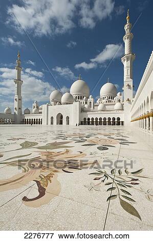 Stock Photo - Courtyard of the Sheikh Zayed Grand Mosque; Abu Dhabi, United Arab Emirates. Fotosearch
